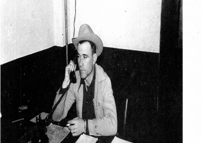 Former Sheriff Amos G Ward taking a call